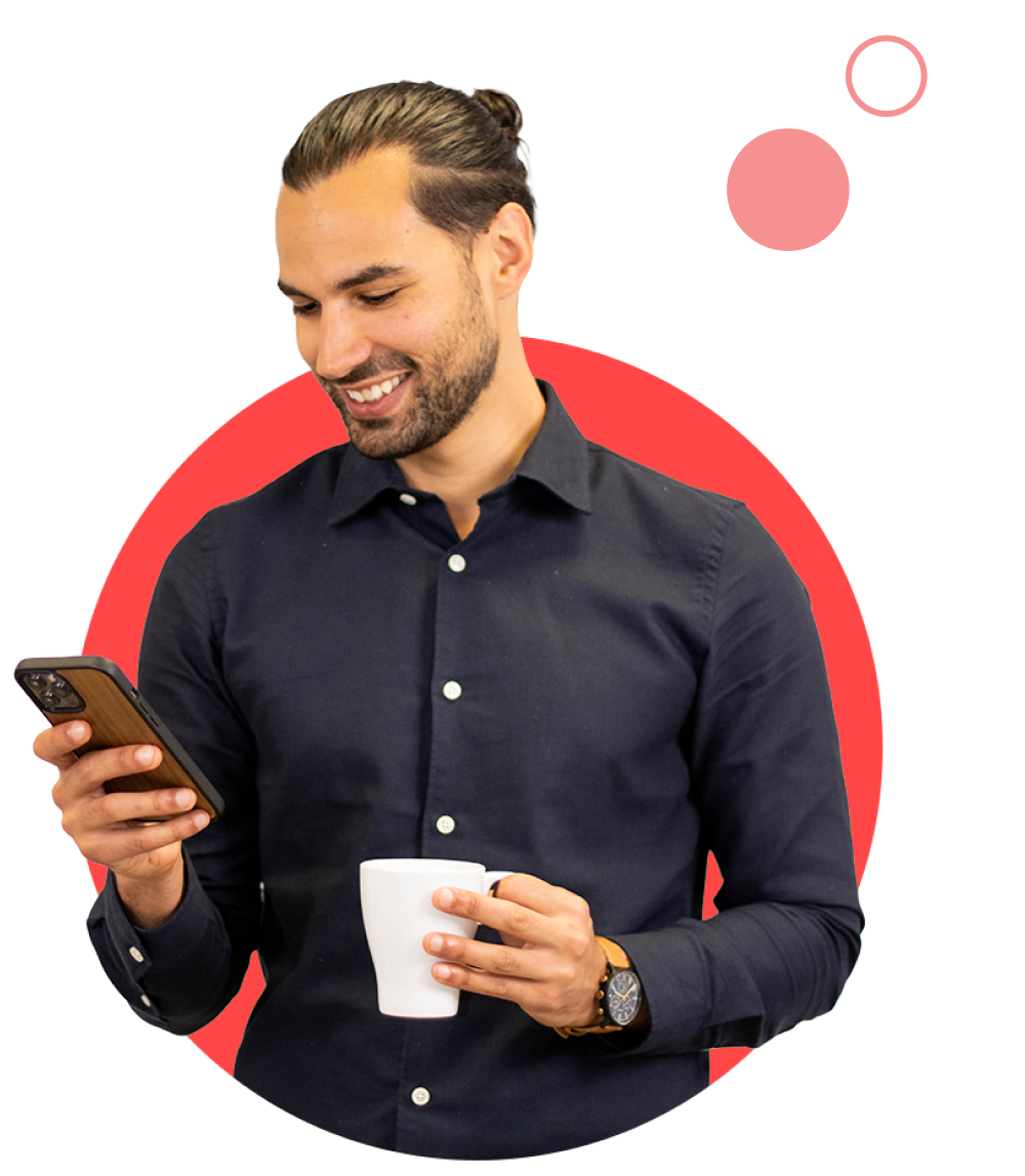 Male colleague on his phone with cup in his hand popping out of red circle
