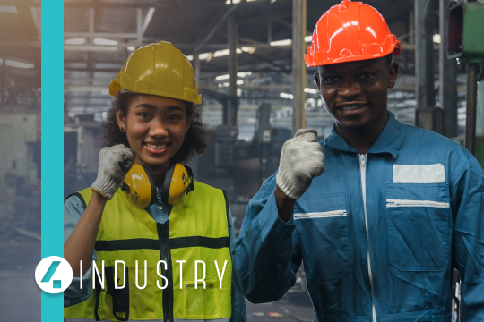 Factory workers with PPE, smiling and their fists in the air celebrating. 4Industry logo.