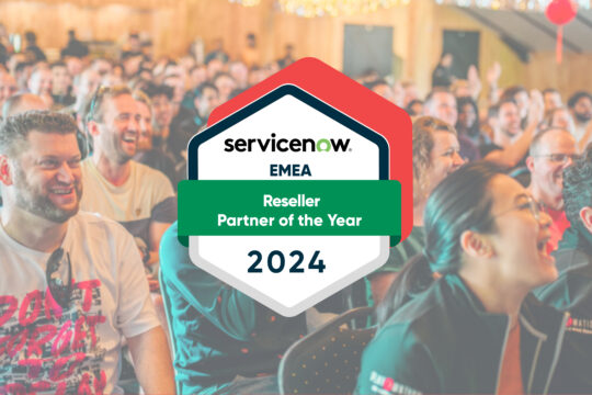 Group of people sitting and smiling in the background along with Servicenow award logo on the front.