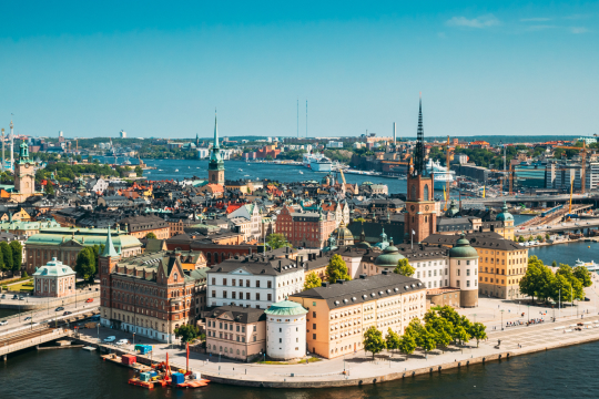 Skyline of Stockholm, image of multiple buildings and clear blue sky. Feature image for plat4mation new office in Sweden